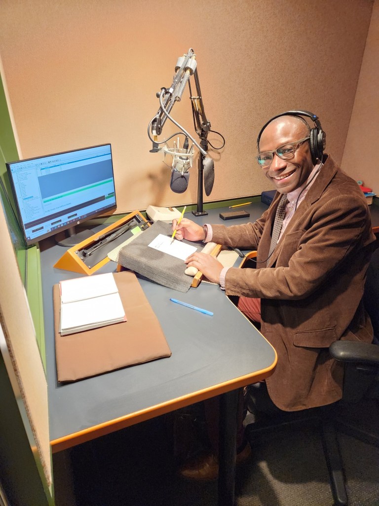 Andrew Moodie is all smiles as he records Black Love Letters in the Beyond Print Studio in Toronto.